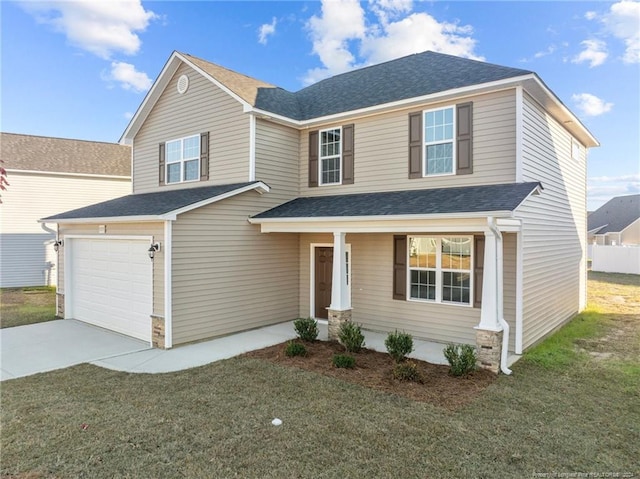 front facade with a garage and a front yard