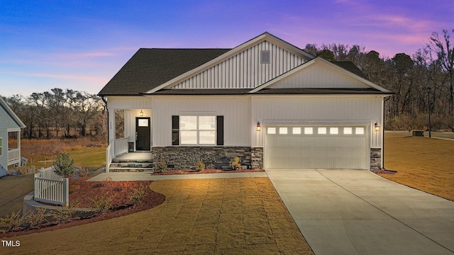 view of front of property with a garage