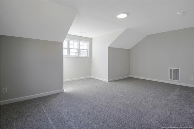 5411 Seedling Rd, Fayetteville, NC 28311 - bonus room featuring carpet floors, baseboards, and vaulted ceiling