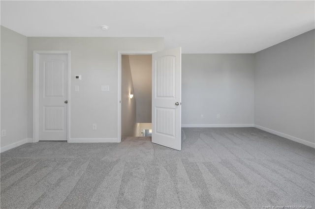 5411 Seedling Rd, Fayetteville, NC 28311 - empty room with carpet flooring and baseboards