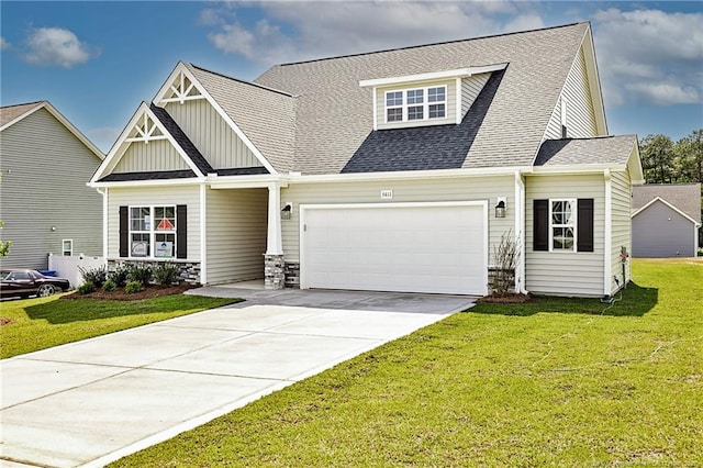 5411 Seedling Rd, Fayetteville, NC 28311 - view of front facade featuring concrete driveway, a garage, stone siding, and board and batten siding