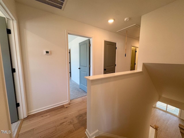 hall featuring light hardwood / wood-style floors