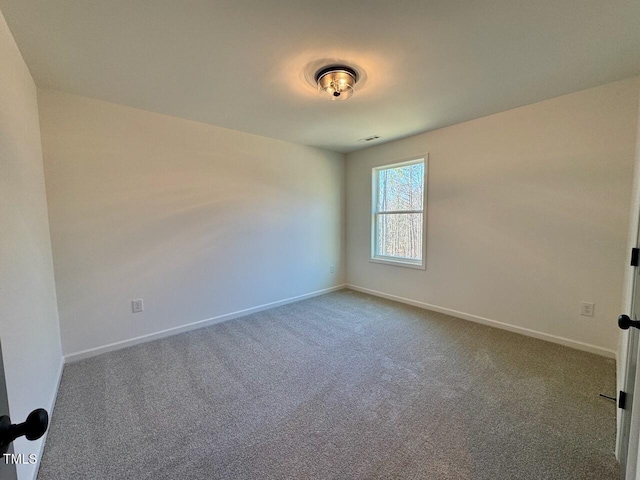 view of carpeted spare room