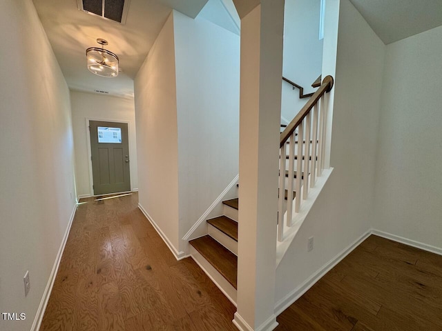 entrance foyer featuring hardwood / wood-style floors