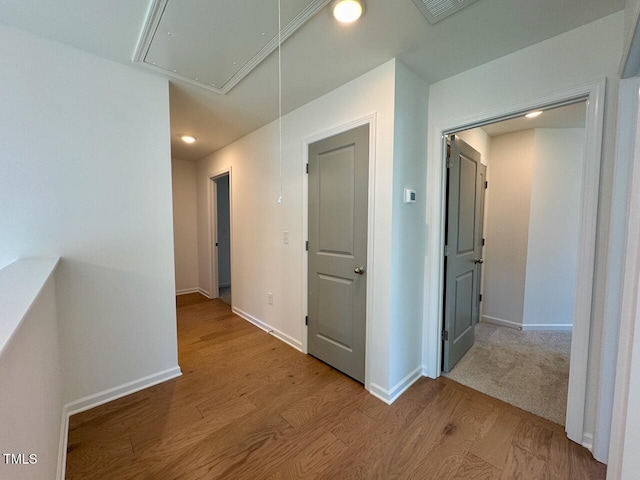 hallway featuring light hardwood / wood-style floors