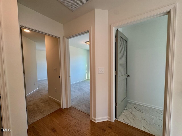 hall featuring hardwood / wood-style flooring