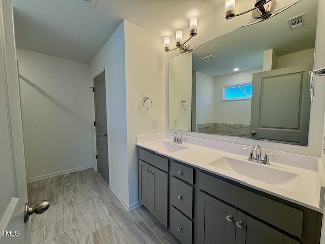 bathroom featuring vanity