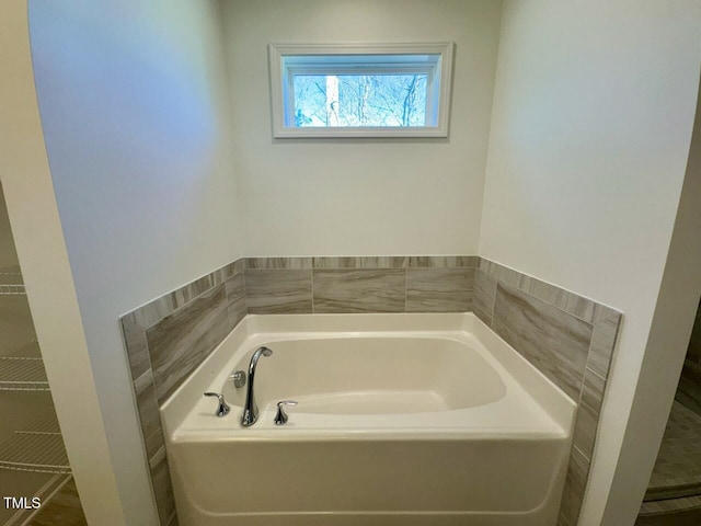 bathroom with a washtub