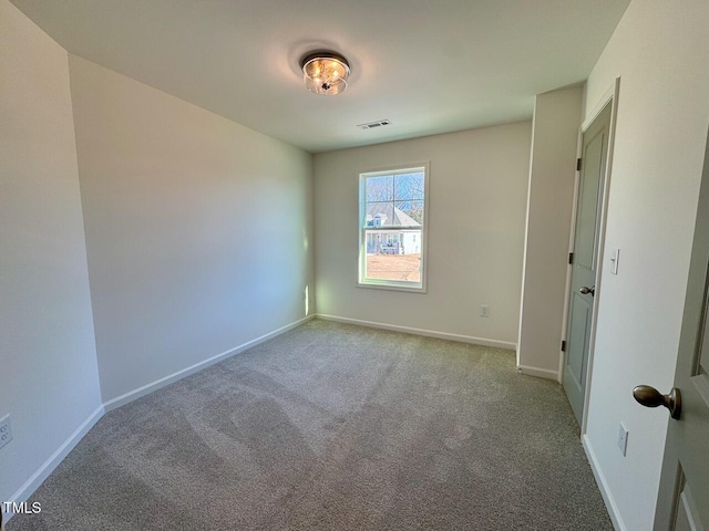 view of carpeted spare room