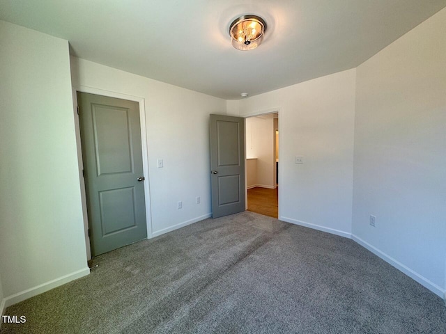 unfurnished bedroom with carpet