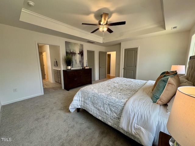 bedroom with light carpet, a raised ceiling, and crown molding