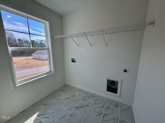 washroom with laundry area, baseboards, marble finish floor, hookup for a washing machine, and electric dryer hookup