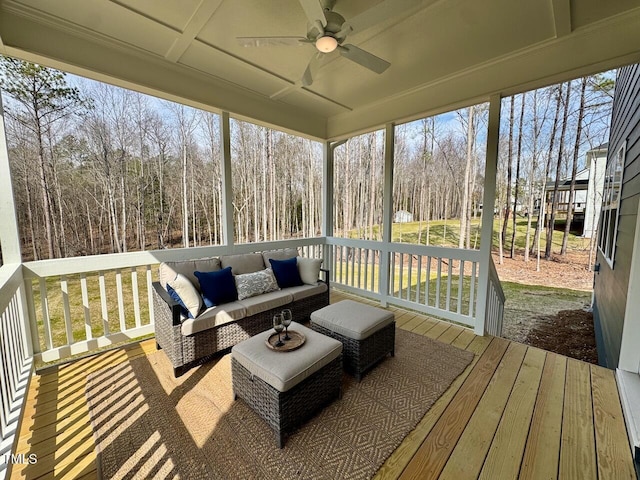 sunroom / solarium with ceiling fan