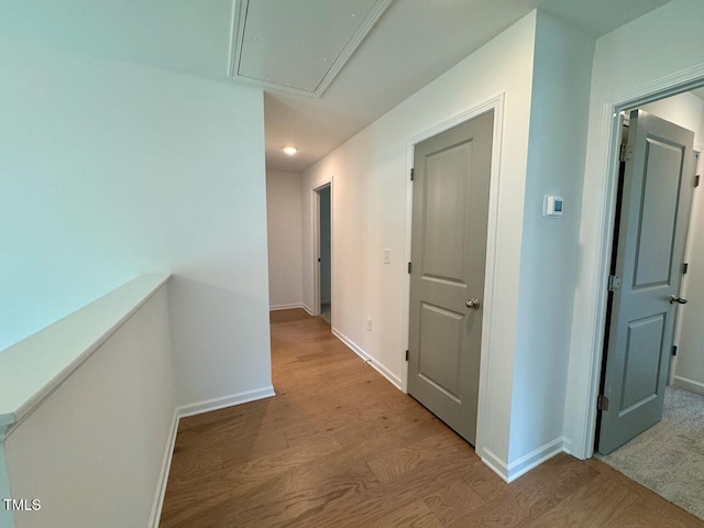 196 Grand Griffon Way, Lillington, NC 27546 - corridor featuring attic access, light wood-style flooring, baseboards, and recessed lighting