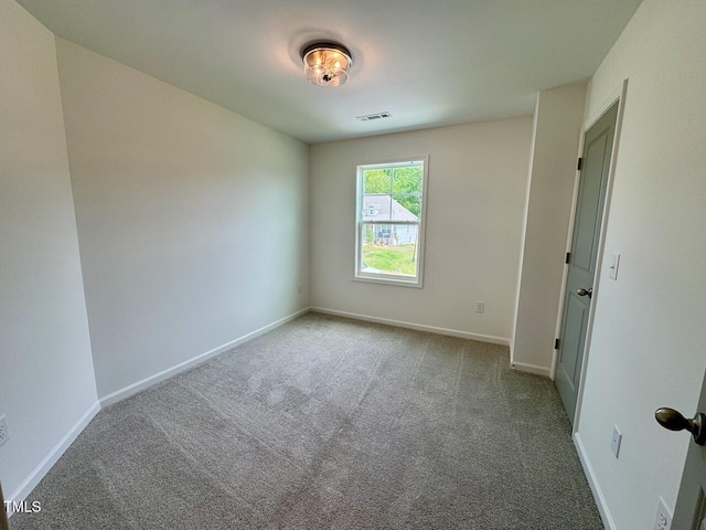 196 Grand Griffon Way, Lillington, NC 27546 - carpeted empty room featuring baseboards