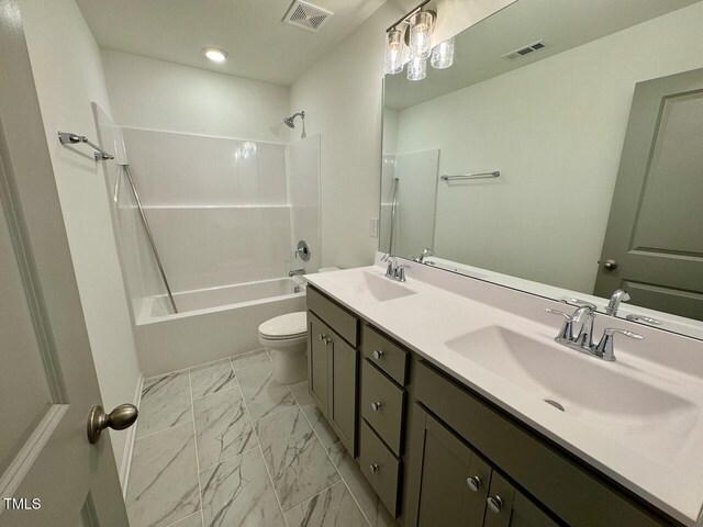196 Grand Griffon Way, Lillington, NC 27546 - full bathroom with marble finish flooring, toilet, double vanity, washtub / shower combination, and recessed lighting