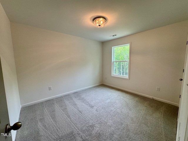 196 Grand Griffon Way, Lillington, NC 27546 - carpeted spare room with baseboards
