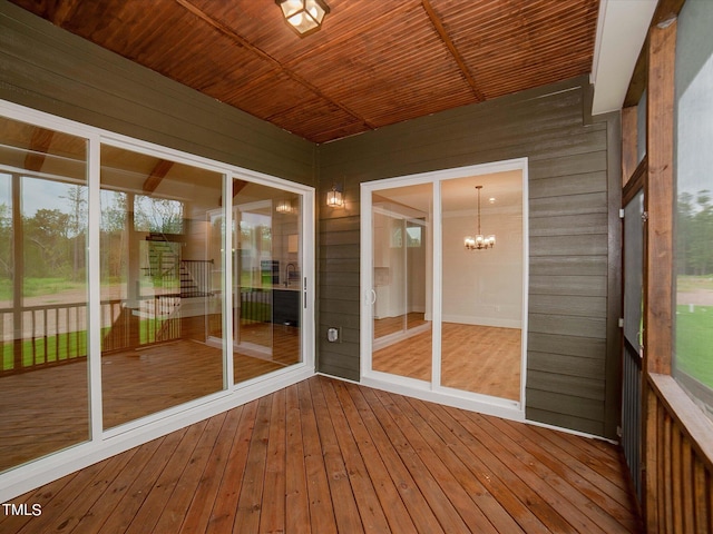 16 Autumn Breeze Ct, Angier, NC 27501 - unfurnished sunroom featuring a chandelier