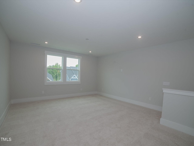 16 Autumn Breeze Ct, Angier, NC 27501 - unfurnished room featuring light colored carpet, recessed lighting, and baseboards