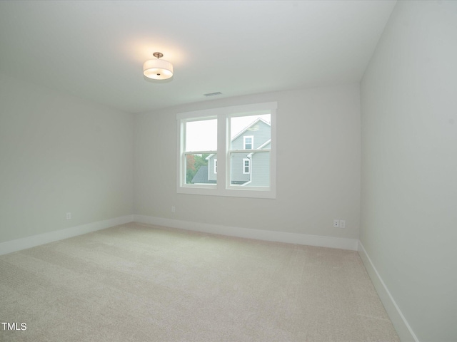 16 Autumn Breeze Ct, Angier, NC 27501 - carpeted spare room featuring baseboards