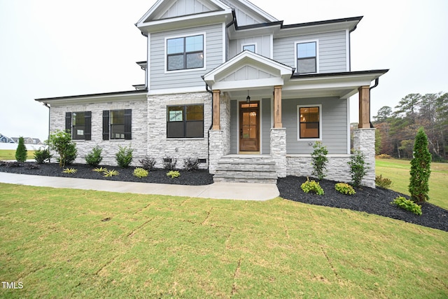 craftsman-style home with a front lawn