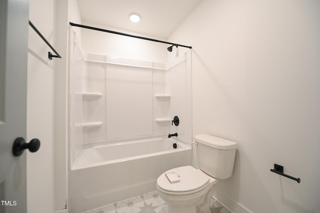 bathroom featuring toilet and bathtub / shower combination