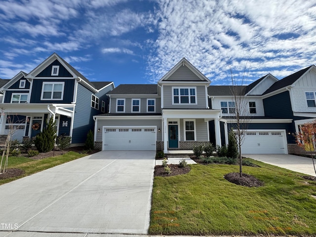 view of front of house featuring a garage and a front yard