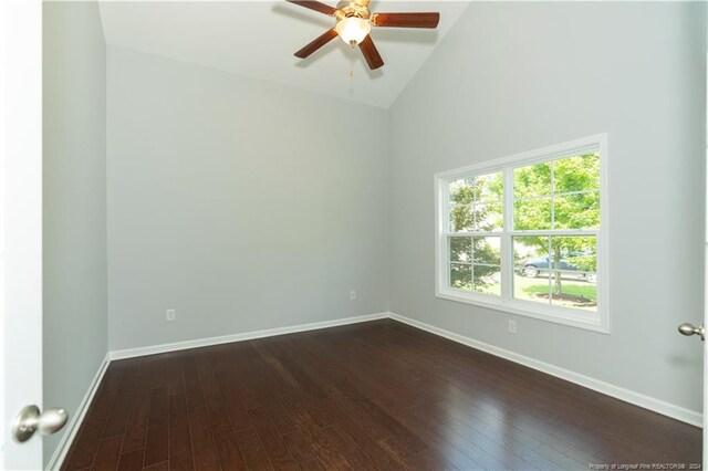 spare room featuring high vaulted ceiling, hardwood / wood-style floors, ceiling fan, and plenty of natural light