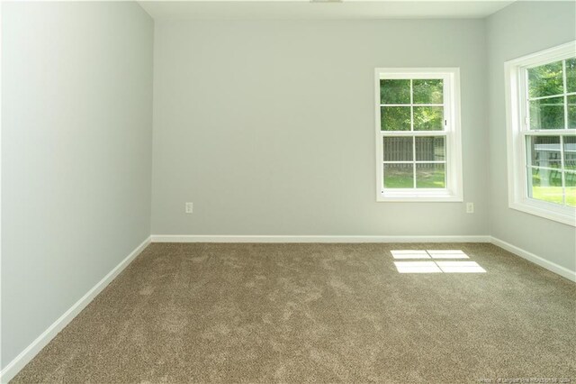 view of carpeted spare room