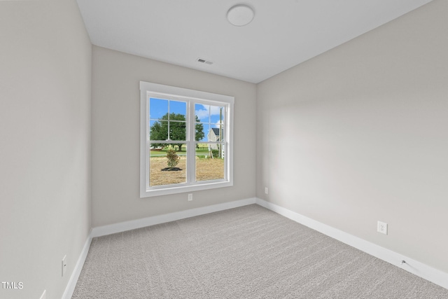 unfurnished room with carpet