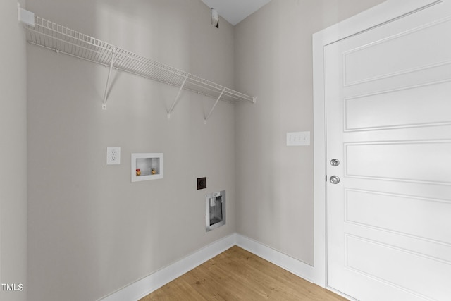 clothes washing area with washer hookup, wood-type flooring, and electric dryer hookup