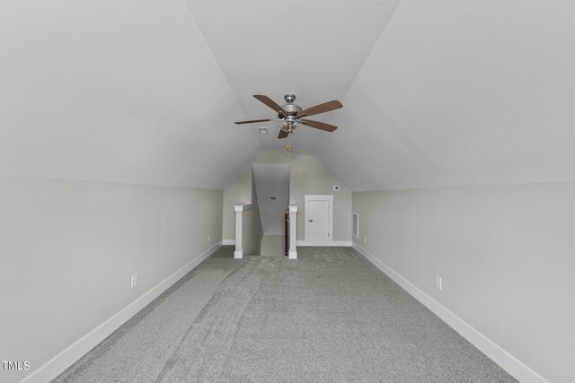 bonus room featuring ceiling fan, carpet floors, and lofted ceiling