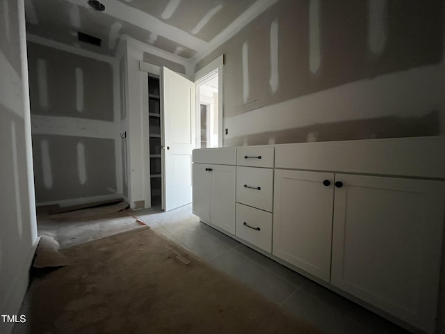 bathroom featuring tile patterned flooring