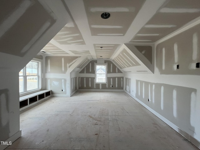 additional living space with vaulted ceiling