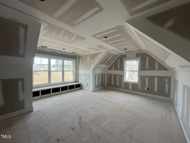 bonus room featuring vaulted ceiling