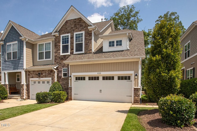 craftsman house with a garage