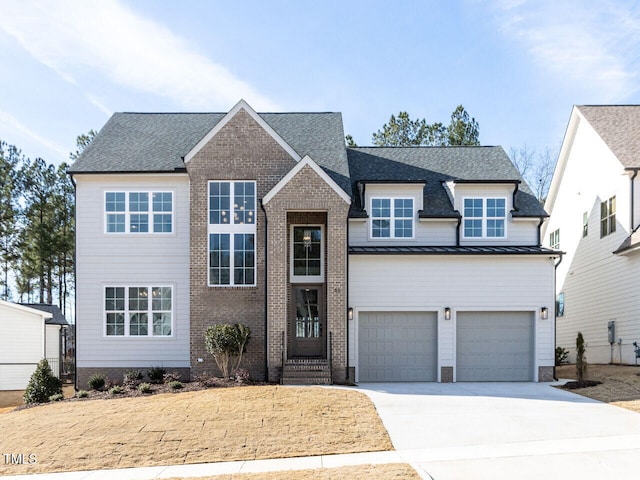 traditional-style home with driveway, a standing seam roof, metal roof, and roof with shingles