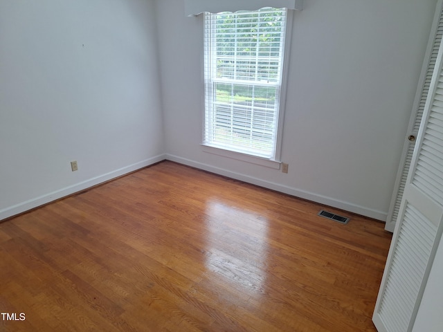 1917 New Hill Olive Chapel Rd, New Hill, NC 27562 - unfurnished room featuring wood finished floors and baseboards