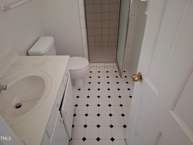 1917 New Hill Olive Chapel Rd, New Hill, NC 27562 - bathroom featuring tile patterned floors, toilet, a stall shower, and vanity