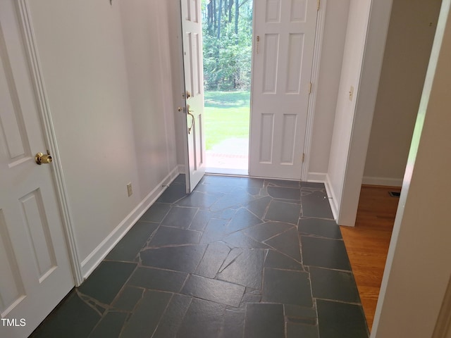 1917 New Hill Olive Chapel Rd, New Hill, NC 27562 - entrance foyer featuring baseboards and stone tile flooring
