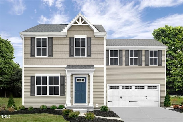 view of front of home with a garage