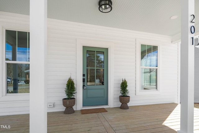 doorway to property with covered porch