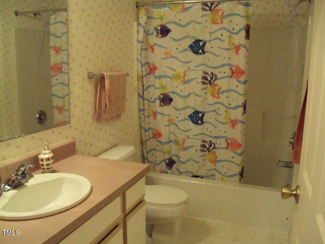 full bathroom featuring shower / bath combo, vanity, tile patterned floors, and toilet