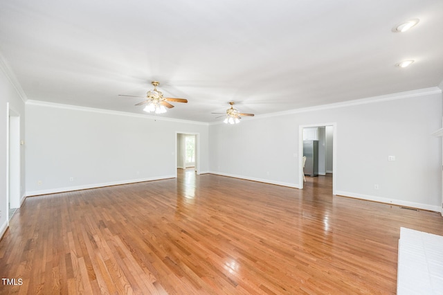 unfurnished living room featuring ornamental molding, light hardwood / wood-style flooring, and ceiling fan