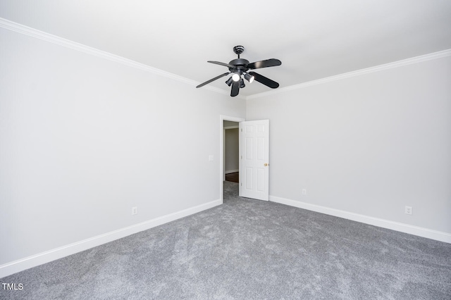 carpeted empty room with crown molding and ceiling fan