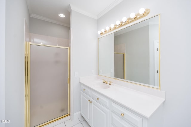 bathroom with tile patterned flooring, a shower with door, vanity, and ornamental molding