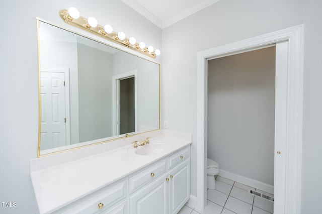 bathroom featuring tile patterned flooring, crown molding, toilet, and vanity