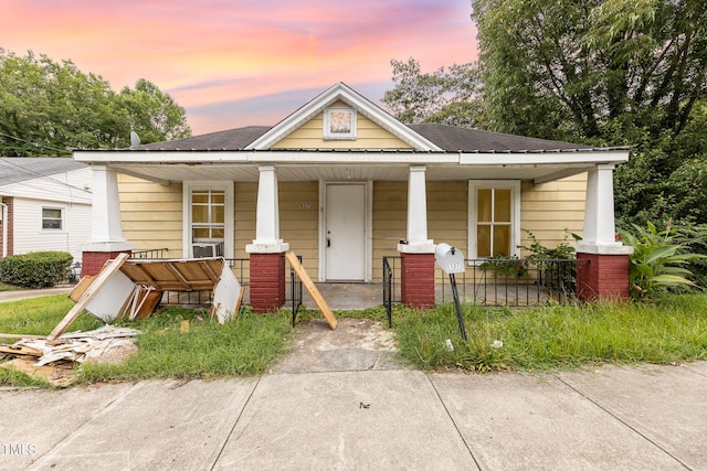 bungalow featuring a porch