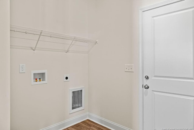 clothes washing area featuring washer hookup, electric dryer hookup, and wood-type flooring