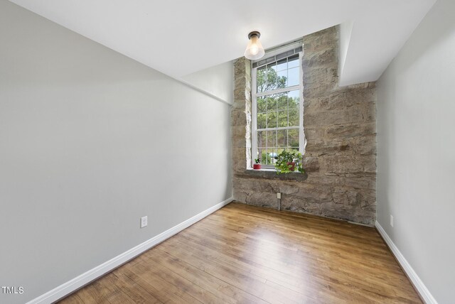 unfurnished room featuring light wood-type flooring